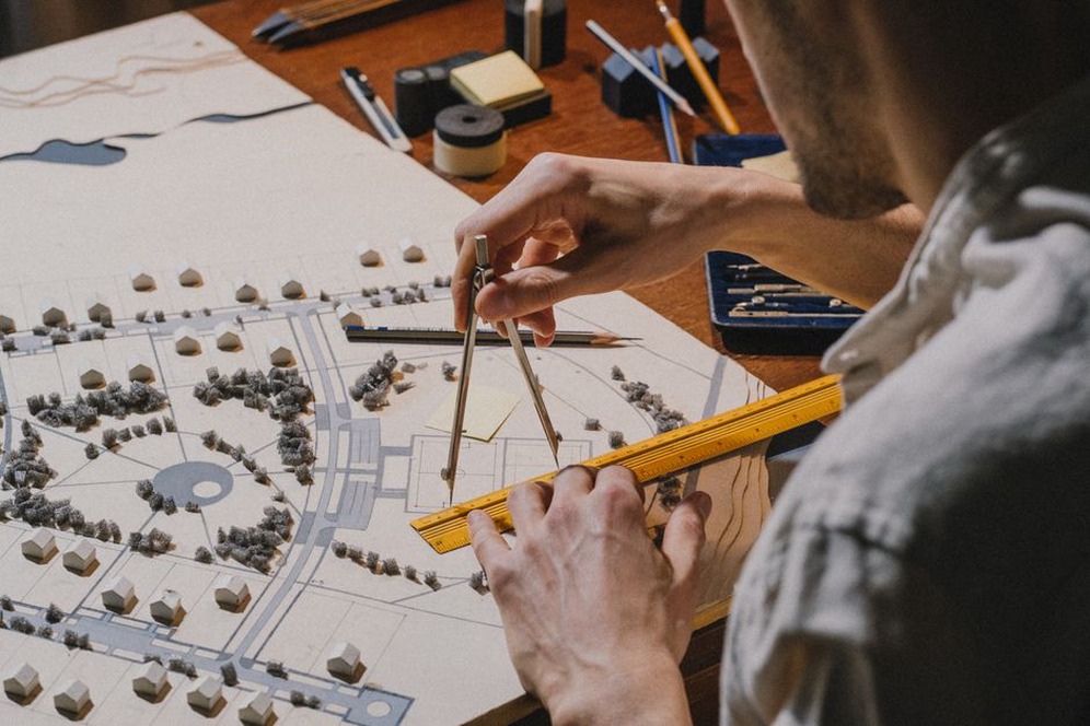 Architect planning integration of smart technologies in urban design