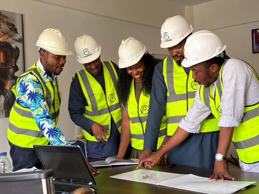 design team coordinating structural and MEP drawings for a mixed-use podium