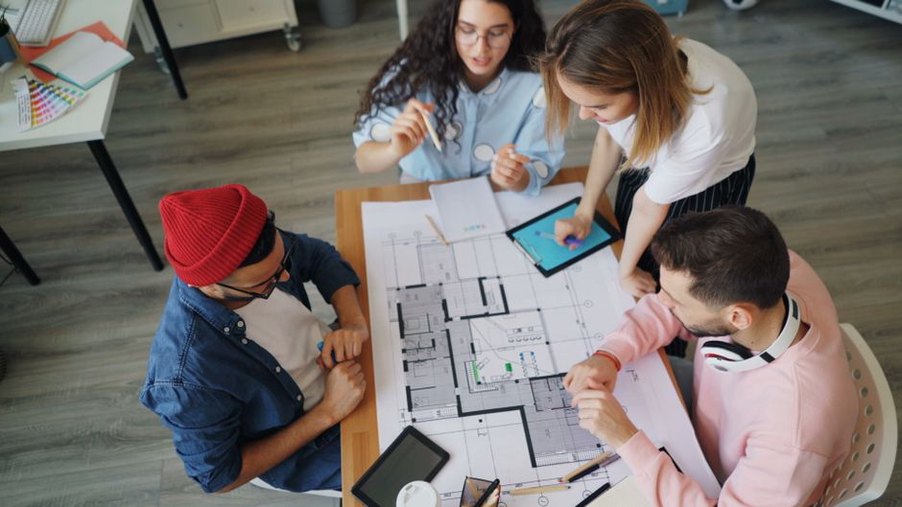 Architects reviewing sustainable design plans