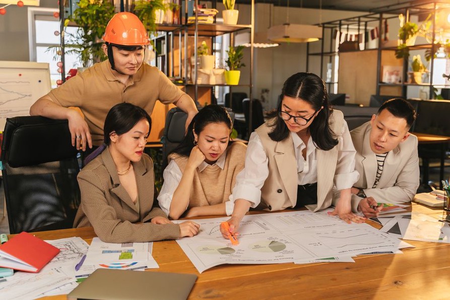 Architects collaborating on smart urban design