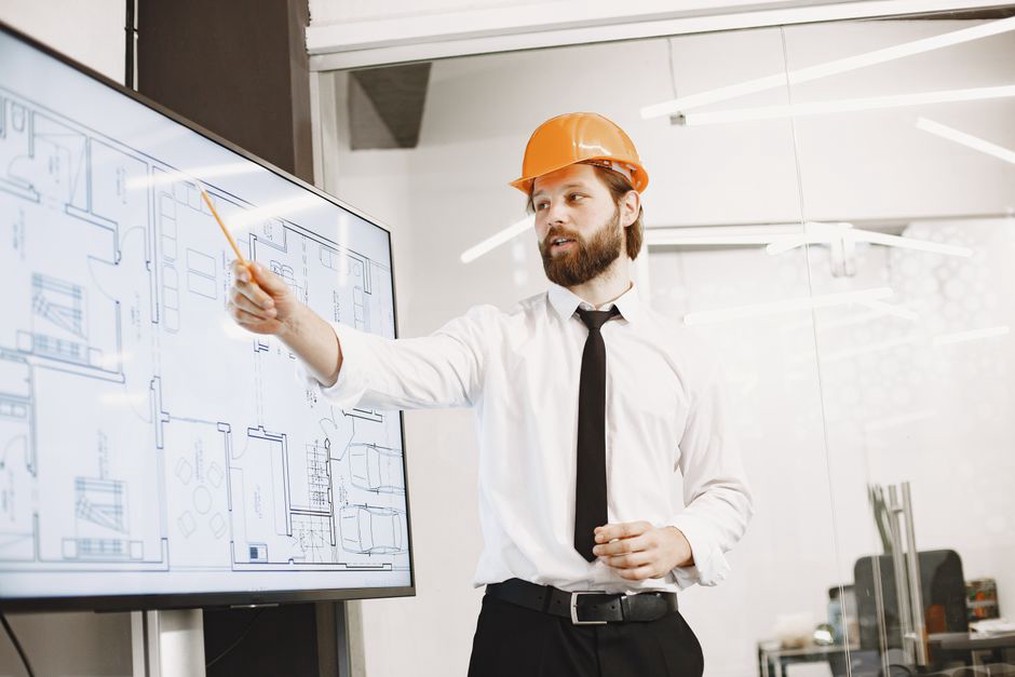 Architects presenting project plans to stakeholders
