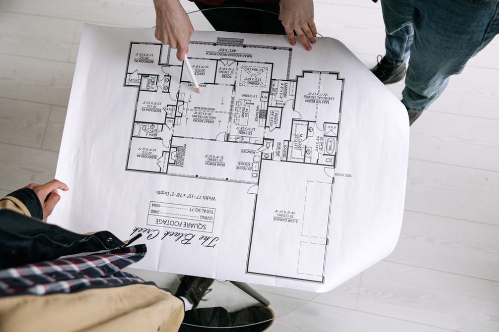 Architects discussing project plans around a table