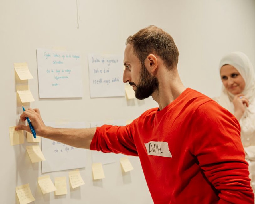 Participants engaging in a community workshop brainstorming session