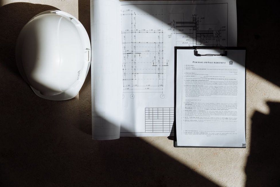 Construction permits and documentation on a desk
