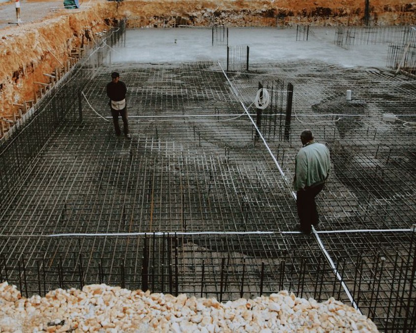 Inspector reviewing construction site progress