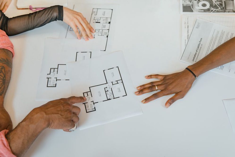 Diverse team collaborating on architectural design project