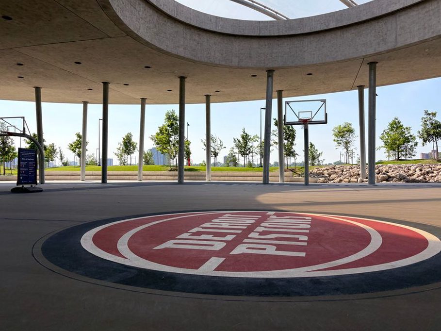 A contemporary recreational facility with green spaces and modern design