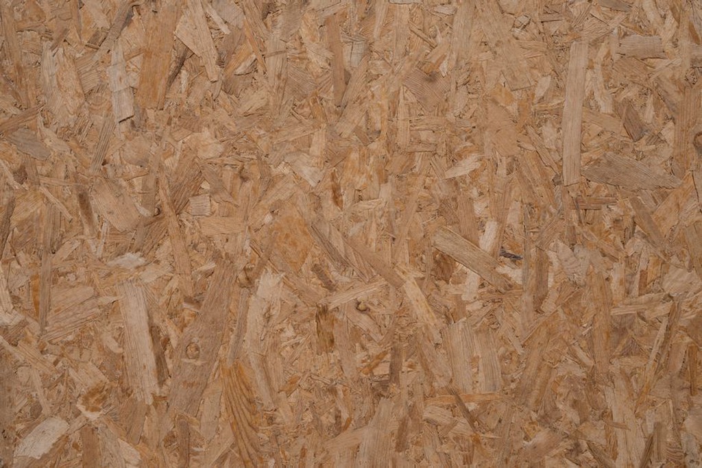textured surface of a grown mycelium insulation panel with organic fibrous pattern