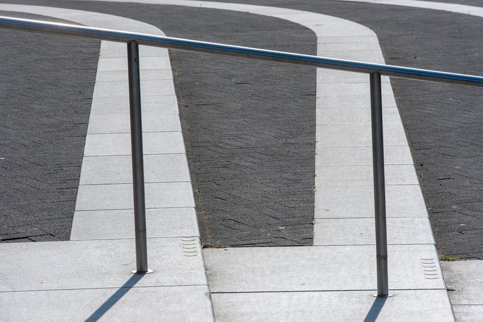A vibrant public park with people and art installations