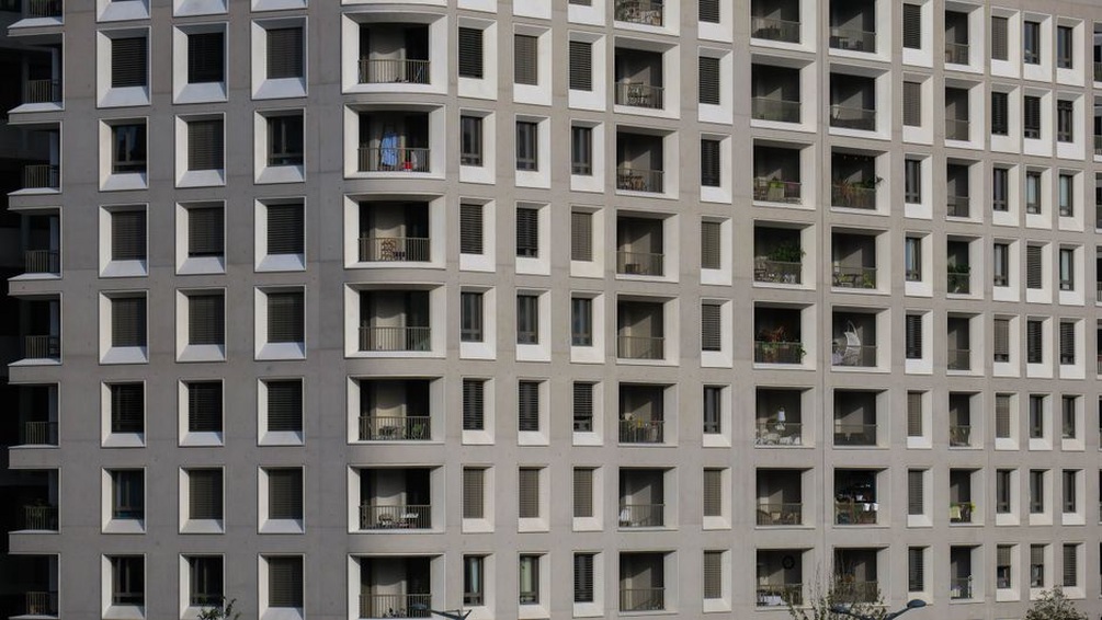 Sealed window frame beside a busy urban street