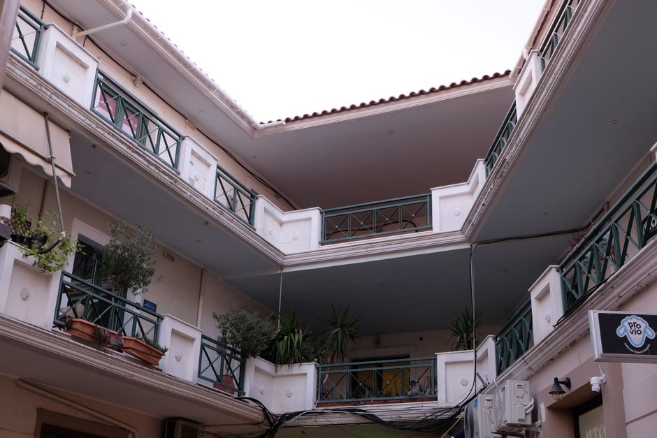 Offset balconies face a shared residential courtyard