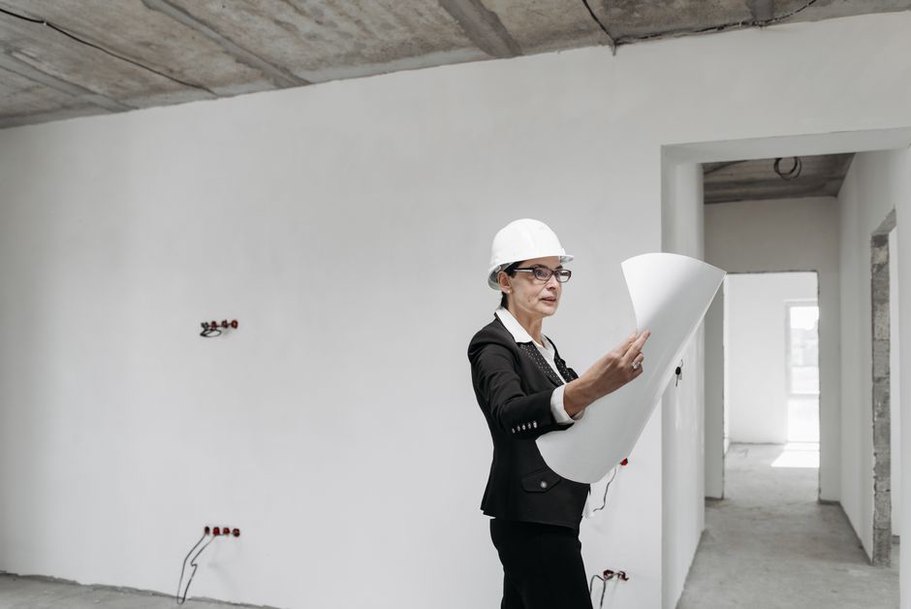 Inspection notes beside a flood-damaged interior wall