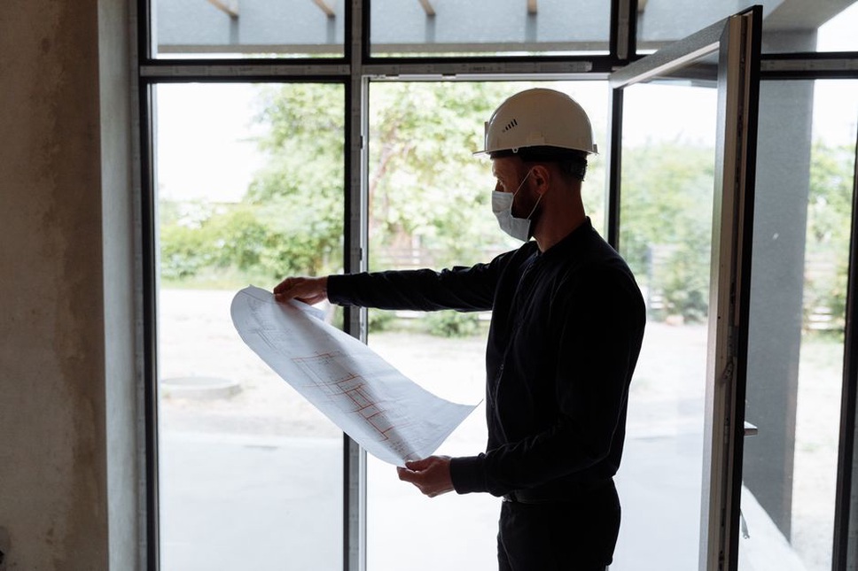 Design team reviewing emergency routes and resilient building systems