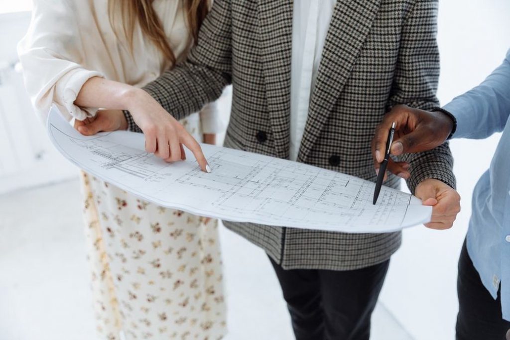 Design and site teams checking a façade package