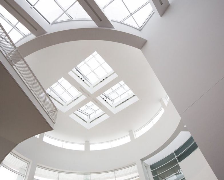 Rooflights distribute soft light across a classroom