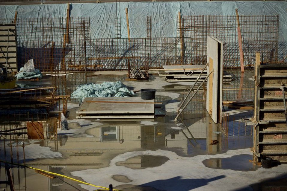Mechanical equipment raised above a lower service area