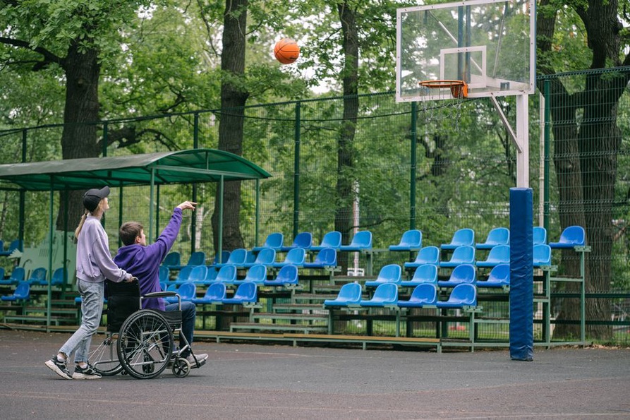 Children using varied accessible play features