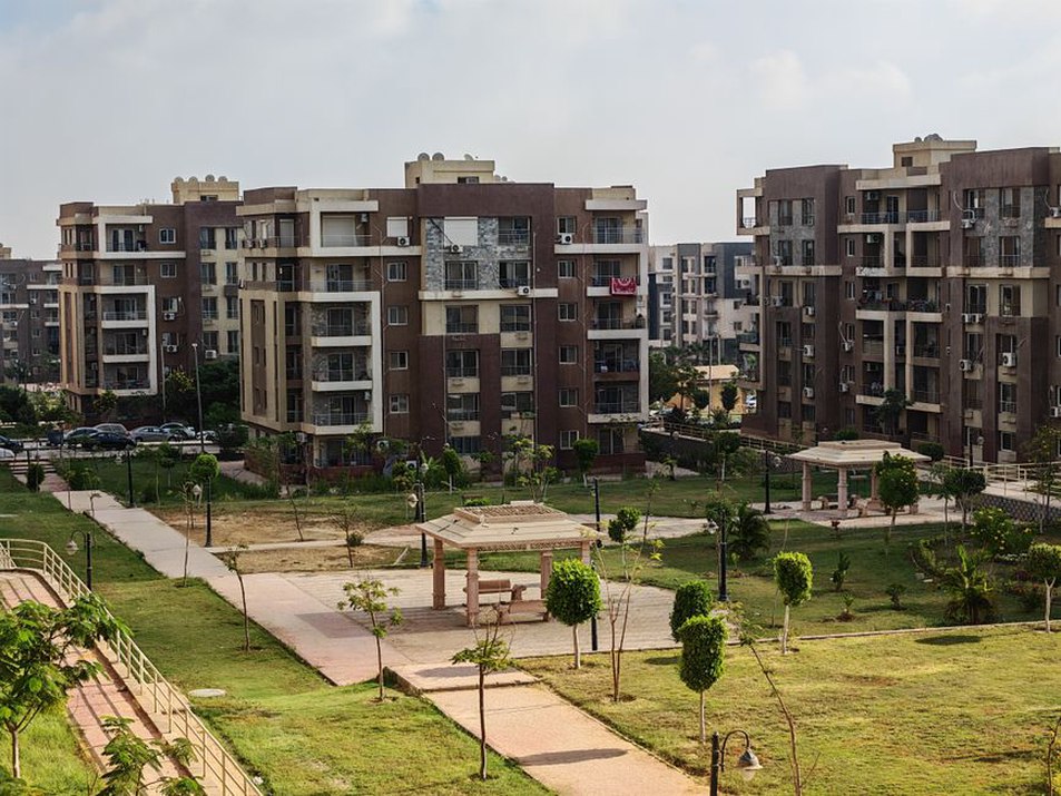 apartment complex surrounded by green areas