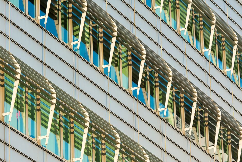 Daylight reaches work areas through shaded windows