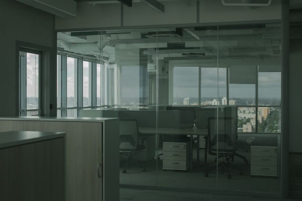 Office with glass partitions for safety and privacy