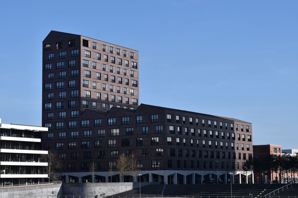 Modern residential building with urban backdrop