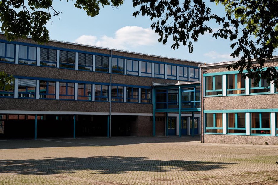 Shaded courtyard supporting outdoor teaching and breaks
