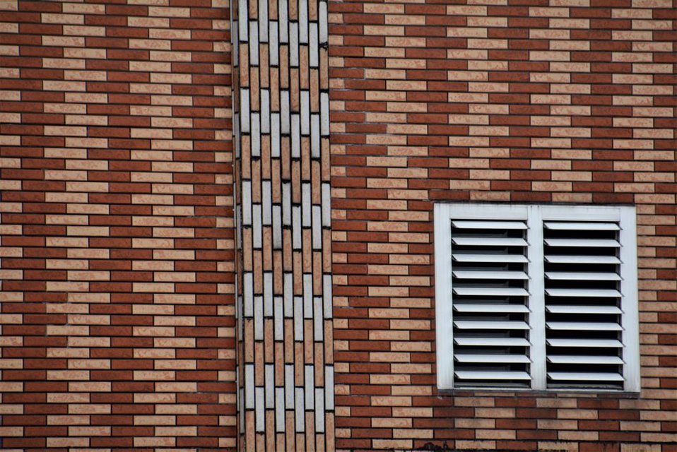 Layered facade components prepared for installation