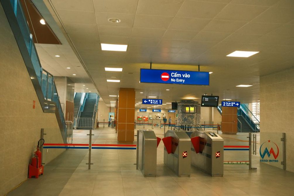 Temporary signs guide visitors toward an entrance