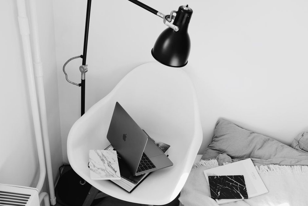 Adjustable light falls across an open book