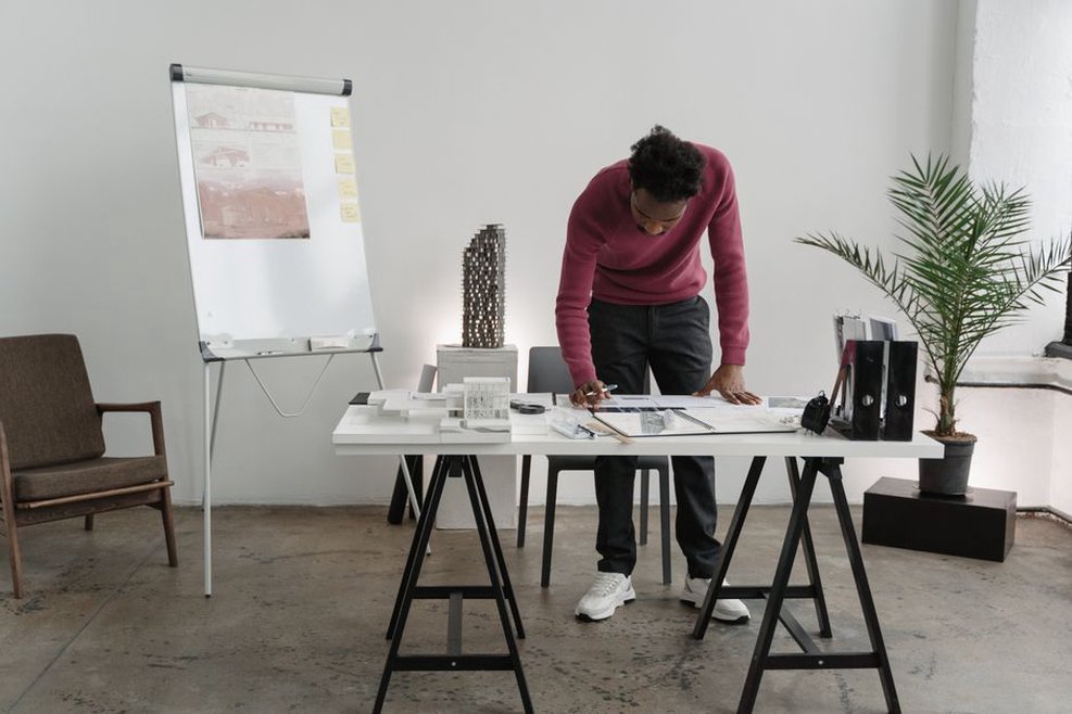 Architect checks current project details against records