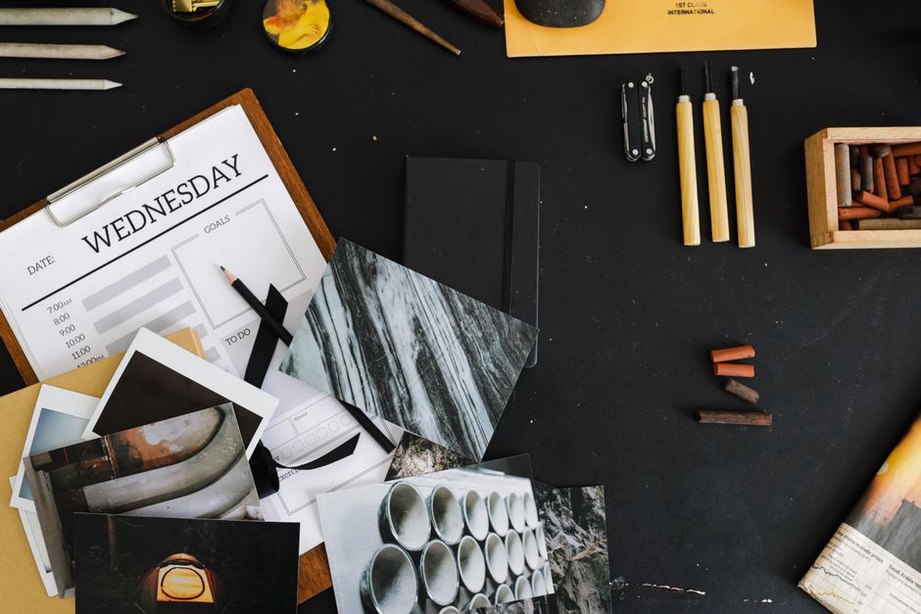 Project schedule beside drawings and site notes
