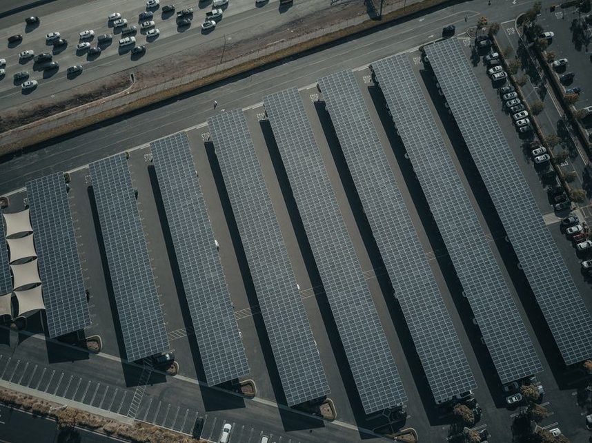 Display showing solar generation beside building electricity use