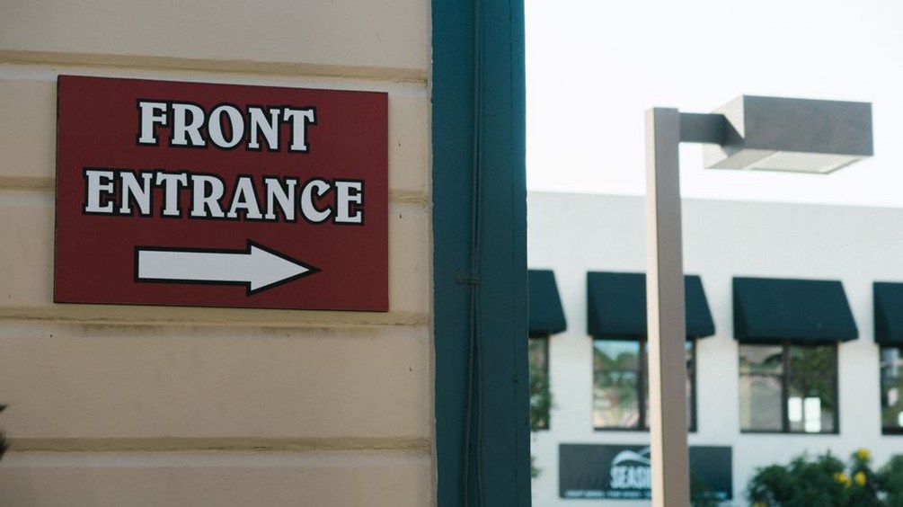 Clear directions identify the active building entrance