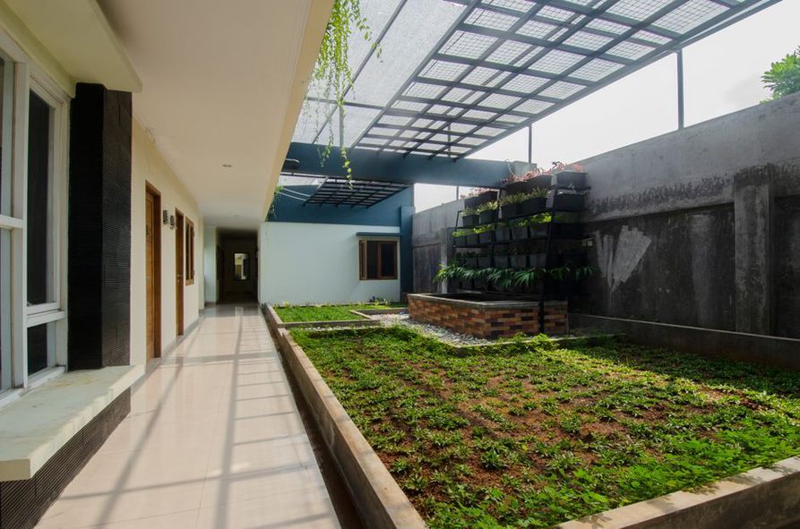Shaded courtyard beside accessible rooftop equipment