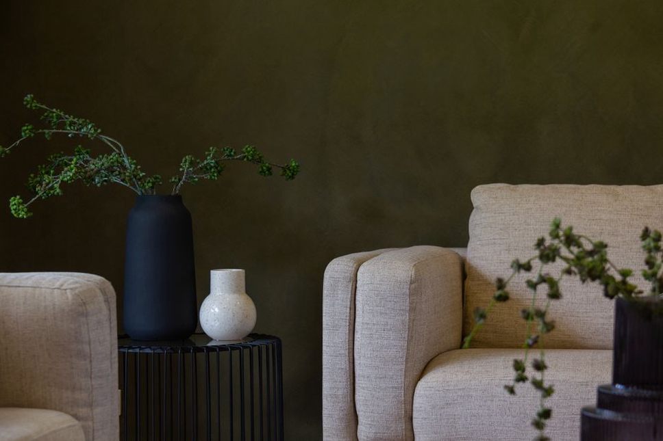 Soft walls and furnishings with a darker table for contrast