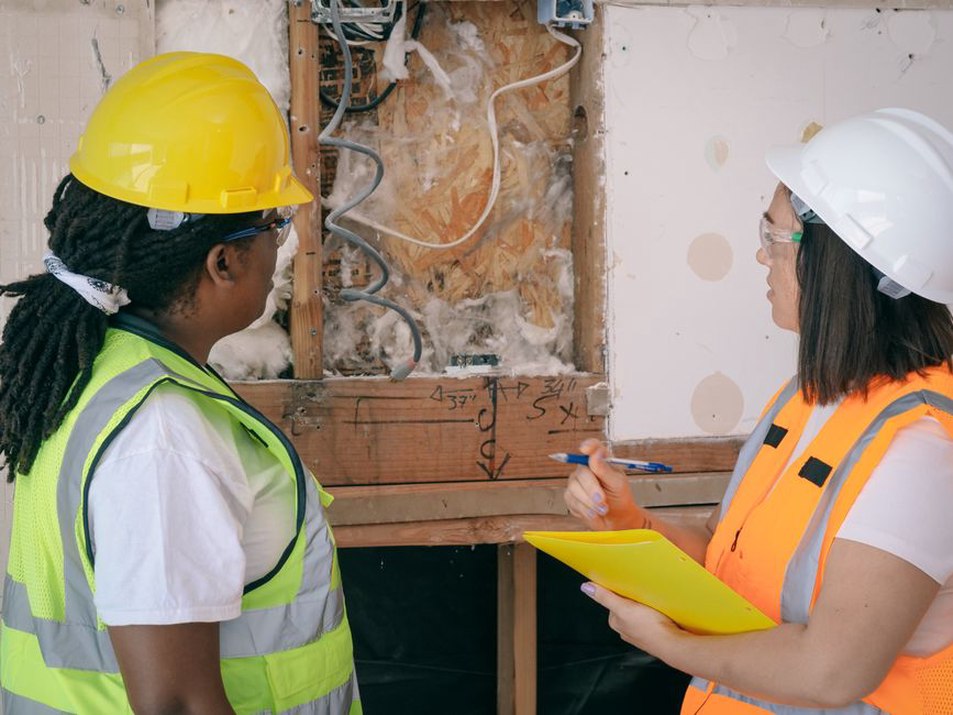 Trade leads review an unresolved building detail
