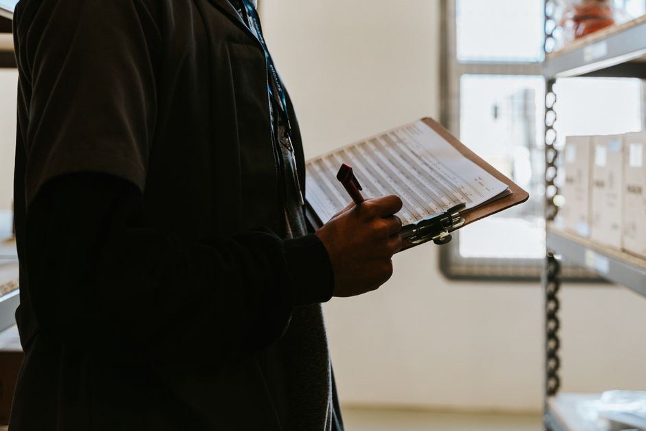 Maintenance notes reviewed inside an occupied building