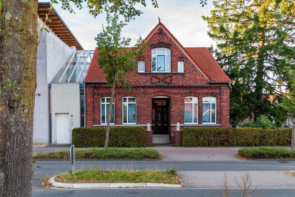 New extension follows the scale of neighboring brick buildings