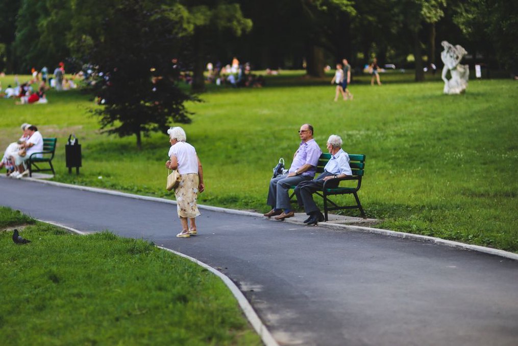 A resting place beside an accessible courtyard path