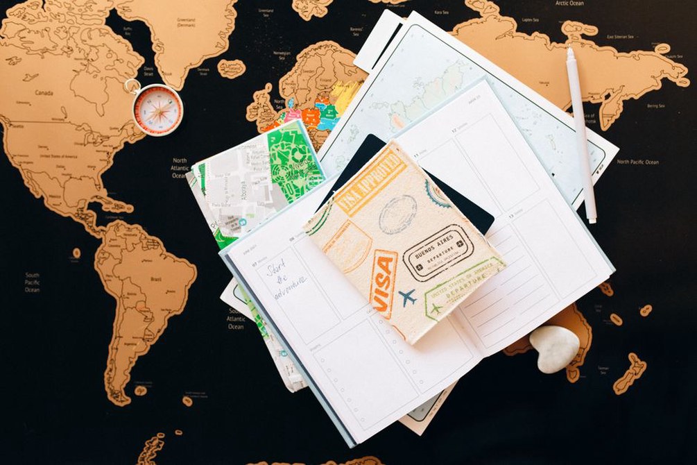 Route notes beside a folded road map