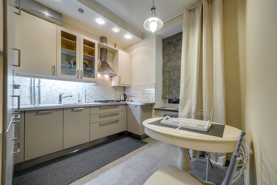 A compact living area with storage beside a work surface