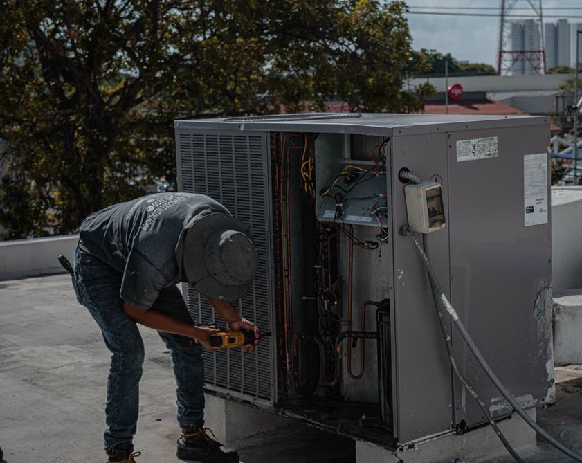 Ventilation equipment being checked before handover